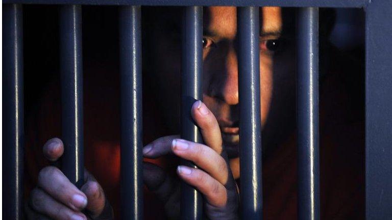 An inmate at a pison in Guatemala in a 2003 file photo