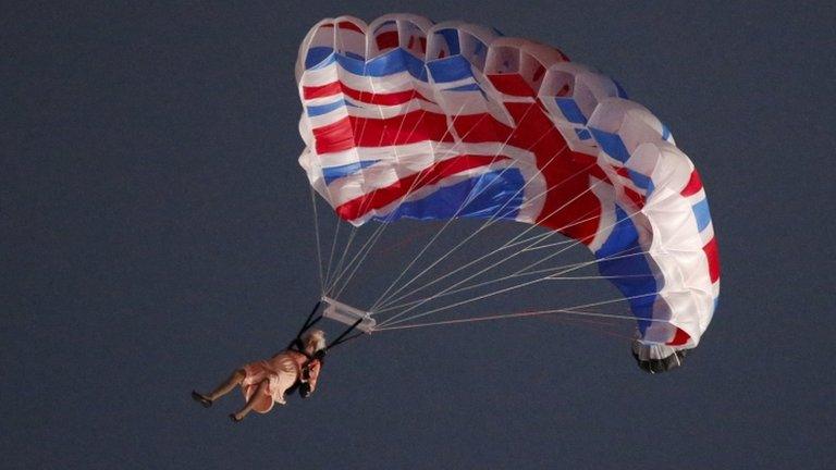 A performer made to look like the Queen parachutes down as part of the London 2012 opening ceremony production