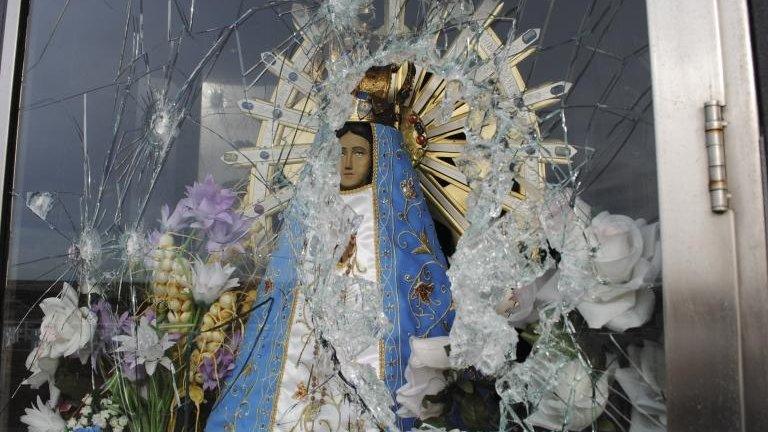 Image of Virgin Mary behind shattered glass near Darwin on the Falklands (Picture released by Commission of Families of Fallen soldiers 30 Jul 2012)