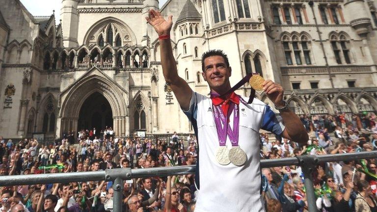 Paralympic gold medal winning cyclist Mark Colbourne during the London 2012 Victory Parade