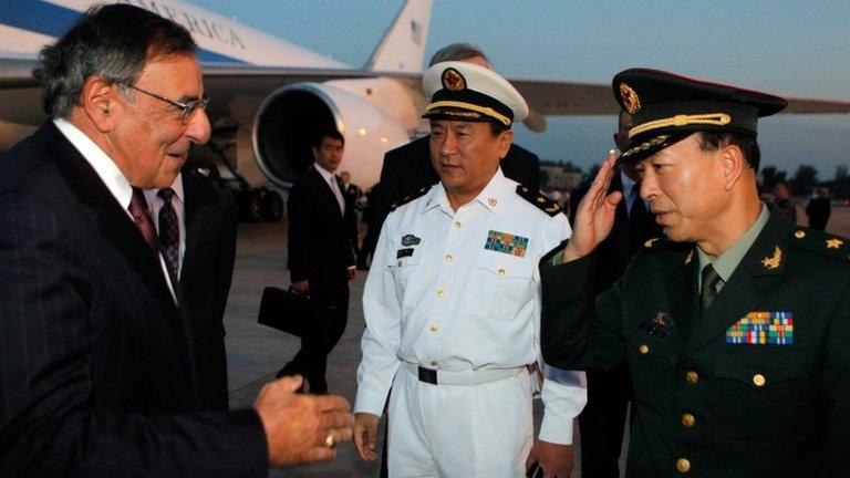 US Secretary of Defence Leon Panetta (L) is welcomed by Chinese military leaders after his arrival in Beijing (17 September)