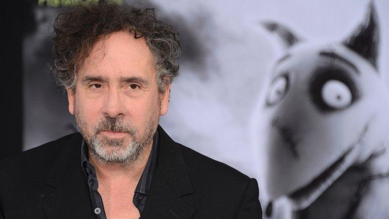 Tim Burton with a Frankenweenie poster