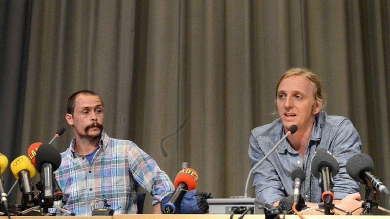 Swedish journalist Martin Schibbye (R) and photojournalist Johan Persson attend a press conference on September 14, 2012 in Stockholm, four days after being freed after 14 months in prison in Ethiopia.