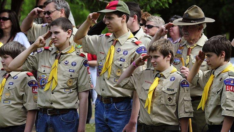 Members of the Boy Scouts of America salute in Hudson, Wisconsin, May 2009