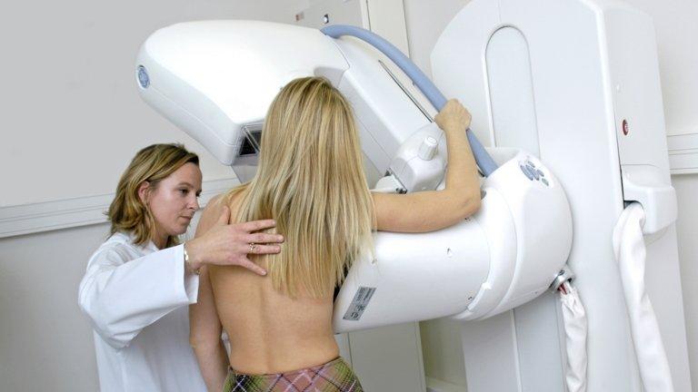 Woman getting mammogram