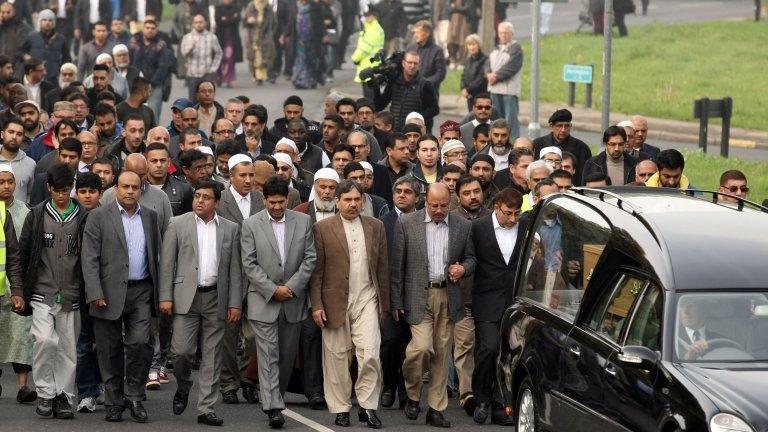 Mourners at the funeral