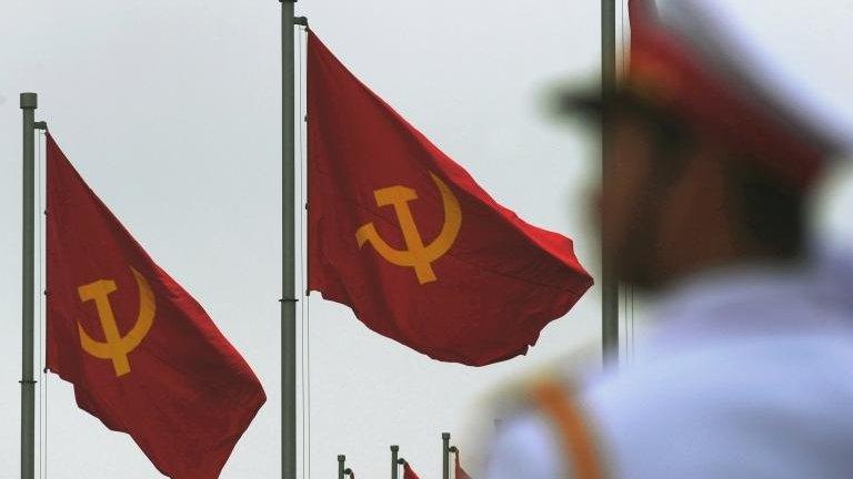 A soldier stands guard in front of late president Ho Chi Minh's mausoleum, 22 October, 2012