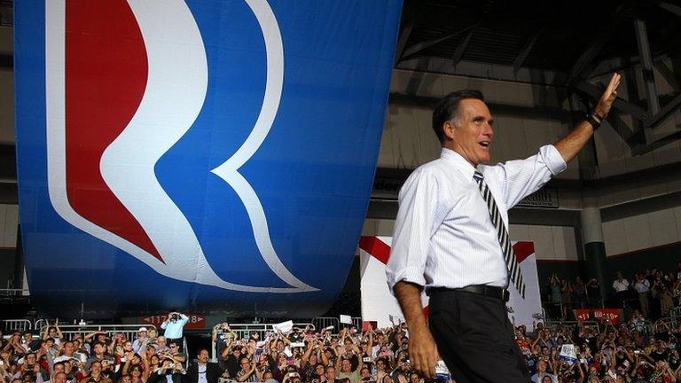 Republican presidential nominee Mitt Romney takes the stage at a campaign rally in Coral Gables, Florida 31 October 2012