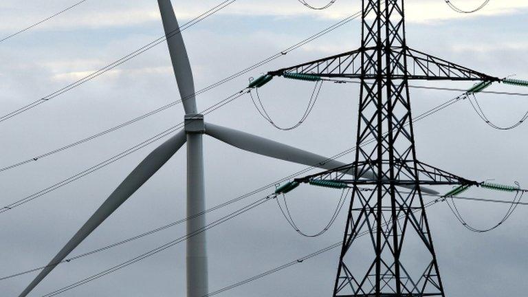 Pylon and wind turbine