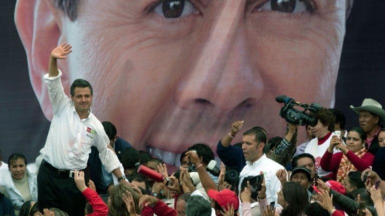 Enrique Pena Nieto waves to supporters (file image)