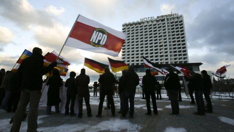 Supporters of Germany's far-right National Democratic Party (NPD) rally in Rostock, 5 December