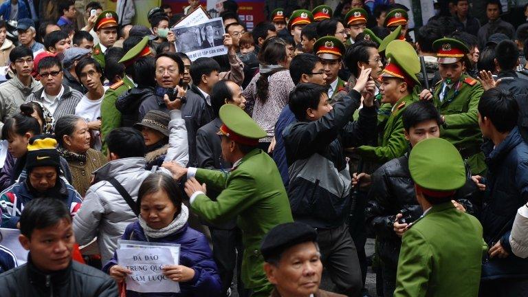 Police break up a protest in Hanoi. 9 Dec 2012