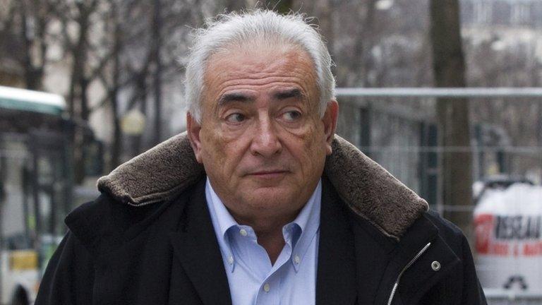 Former IMF head Dominique Strauss-Kahn leaves his apartment in Paris on 10 December 2012