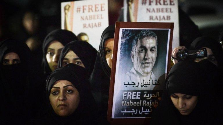 Women in Bahrain hold up a placard calling for the release of Nabeel Rajab (10 December 2012)