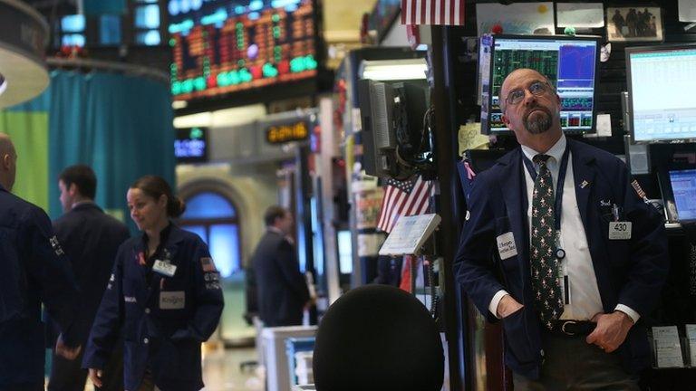 Traders on the floor of the New York Stock Exchange