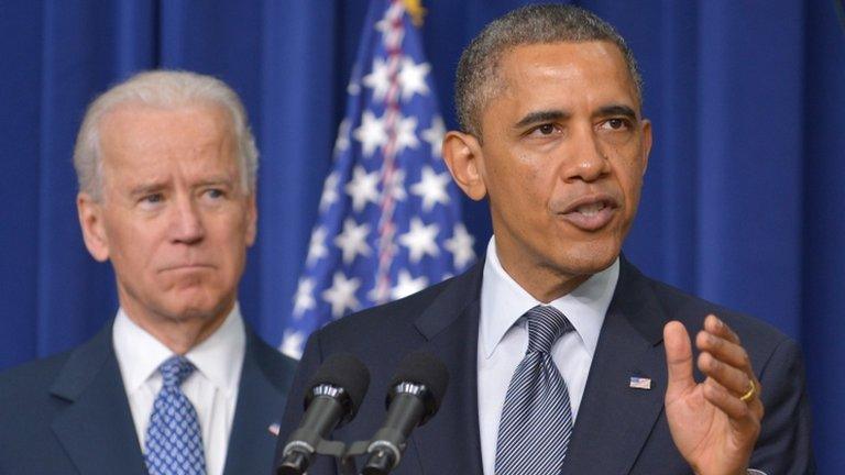 US President Barack Obama speaks on proposals to reduce gun violence as Vice President Joe Biden watches 16 January 2013