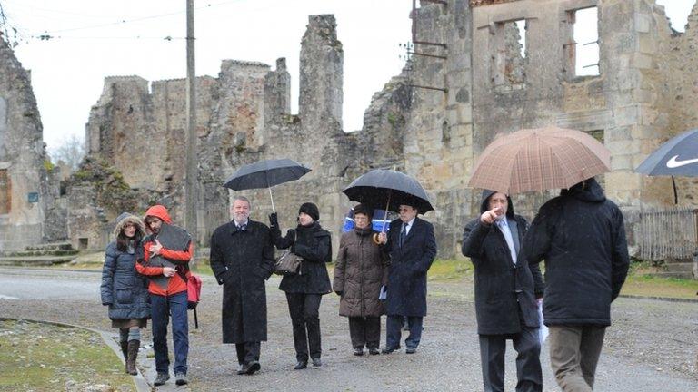 German investigators visit Oradour-sur-Glane, southern France, 29 January