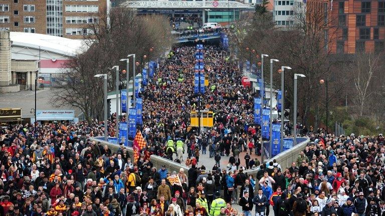 Fans arriving at Wembley for the Capital One Cup final