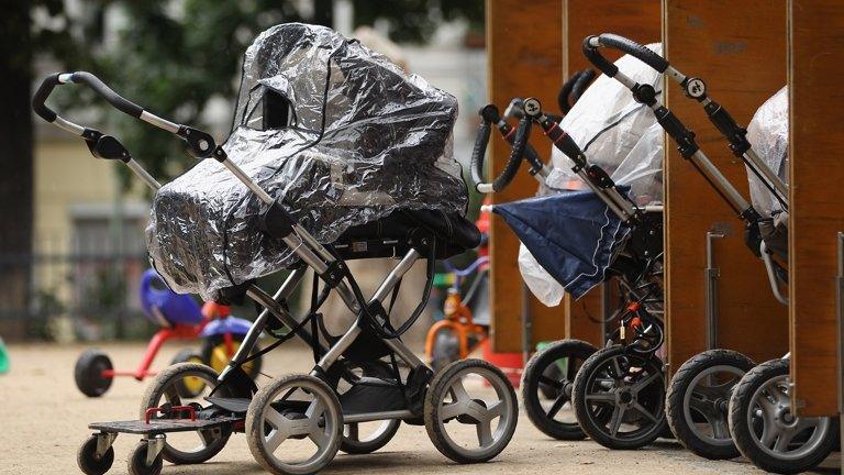 Baby prams stand outside a baby-friendly cafe on July 17, 2012 in Berlin