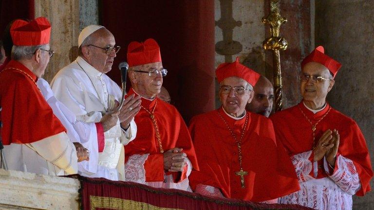 Newly elected Pope Francis I appears on the central balcony of St Peter's Basilica on Wednesday in Vatican City, Vatican