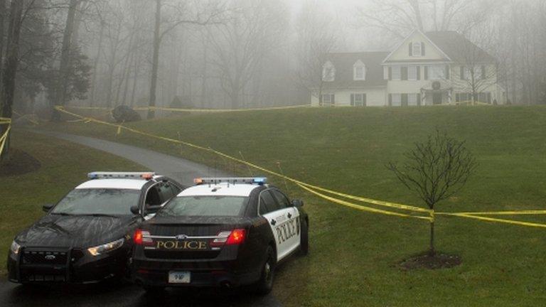 Police outside the home of Nancy Lanza in Newtown, Connecticut on 18 December 2012