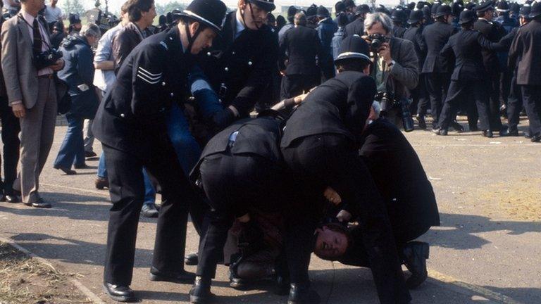 Striking miners clash with police