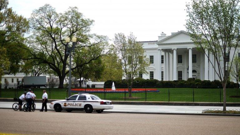 Members of US Secret Service Uniformed Division secure an area in front of White House in Washington, DC, on 17 April 2013