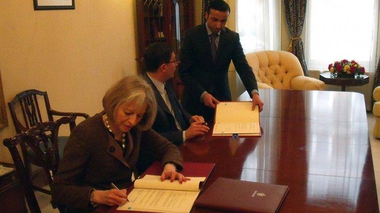 Undated handout photo issued by the Home Office of Home Secretary Theresa May as she signs fair trial guarantees with Jordan that she believes will reassure courts that torture evidence would not be used against Abu Qatada