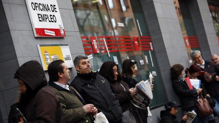 People outside a job centre in Madrid