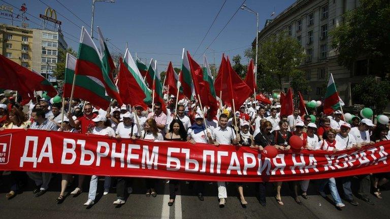 Supporters of the Bulgarian Socialist Party (BSP) with a banner reading, "To bring Bulgaria back to the people"