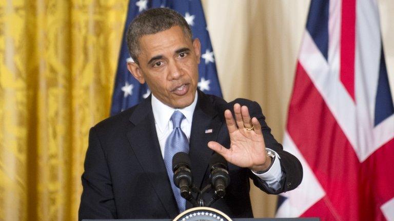 President Barack Obama gestures during a joint news conference with British Prime Minister David Cameron, 13 May 2013