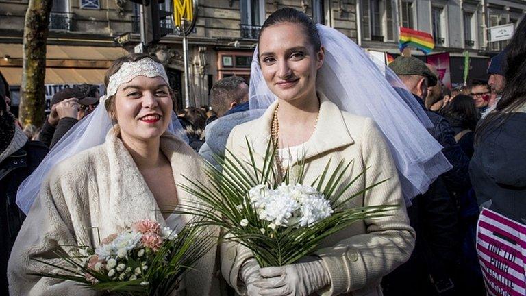 File pic of women posing during a march in favour of gay marriage in Paris, 27 January 2013