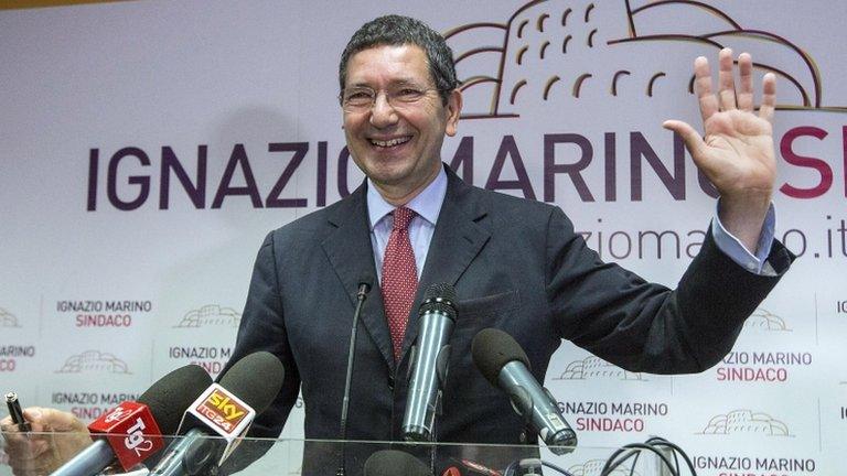 Centre-left candidate Ignazio Marino waves at a meeting in Rome, 27 May