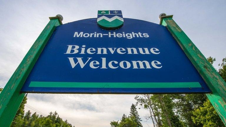 Bienvenue (Welcome) sign in Morin-Heights in the Laurentian Mountains region of Quebec, Canada 3 June 2012