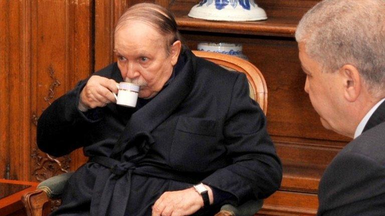 Algerian President Abdelaziz Bouteflika (left) talks to Algerian Prime Minister Abdelmalek Sellal in Paris, June 2013