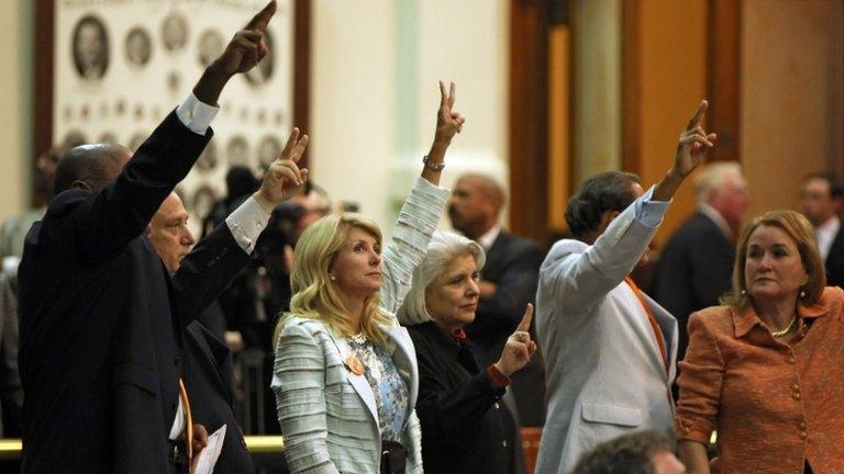 State Sen Wendy Davis holds up two fingers against the anti-abortion bill SB5 in Austin, Texas 25 June 2013