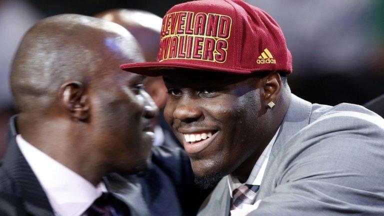 Anthony Bennett smiles after being selected first overall by the Cleveland Cavaliers in the NBA basketball draft, 27 June 2013