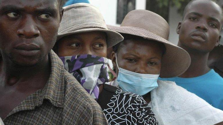 Haitians outside hospital in Saint Marc, October 2010