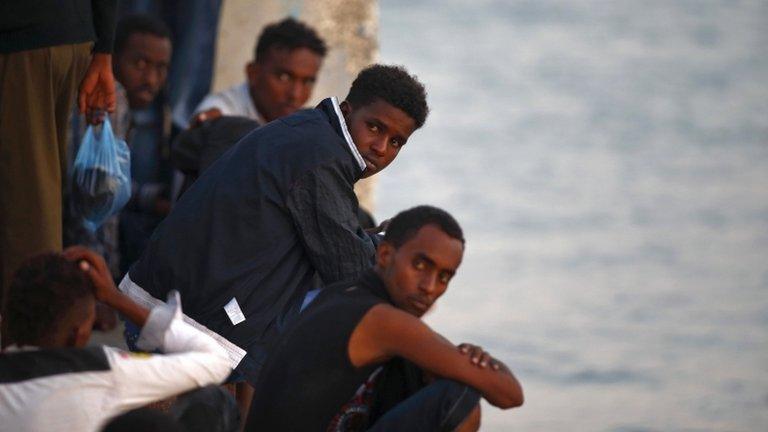 Migrants freshly arrived in at Delimara, Malta, 4 August