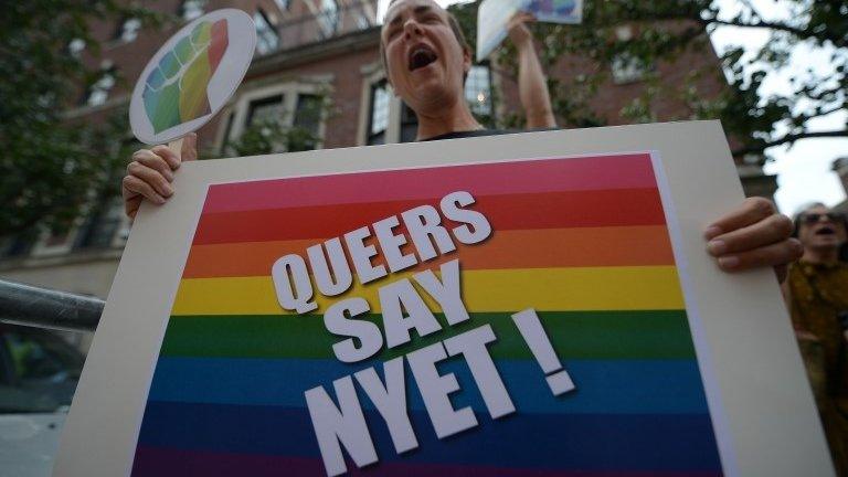 A gay rights activist protests against the new Russian law in New York, 31 July