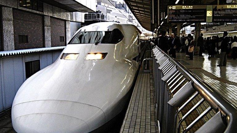 A Japanese bullet train waiting in a station