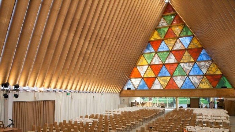 This handout picture taken on 7 August 2013 shows the interior of the Anglican Church of New Zealand made from cardboard, built in Christchurch to replace the historic Anglican cathedral destroyed in the 2011 earthquake