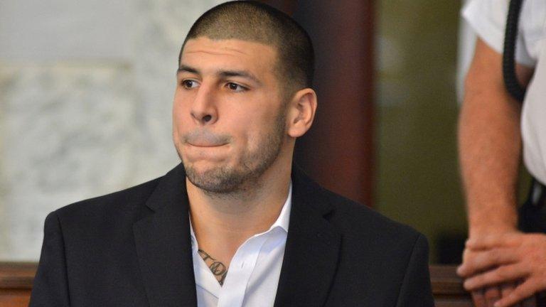 Former New England Patriot football player Aaron Hernandez, listens to proceedings in a court in Attleboro, Massachusetts 22 August 2013