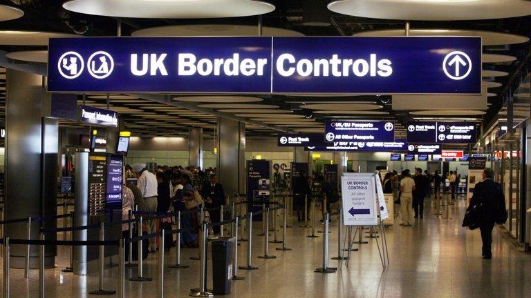 UK Border controls sign at Heathrow Airport