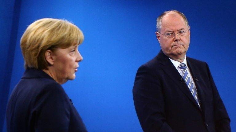 Angela Merkel and Peer Steinbrueck hold a televised election debate