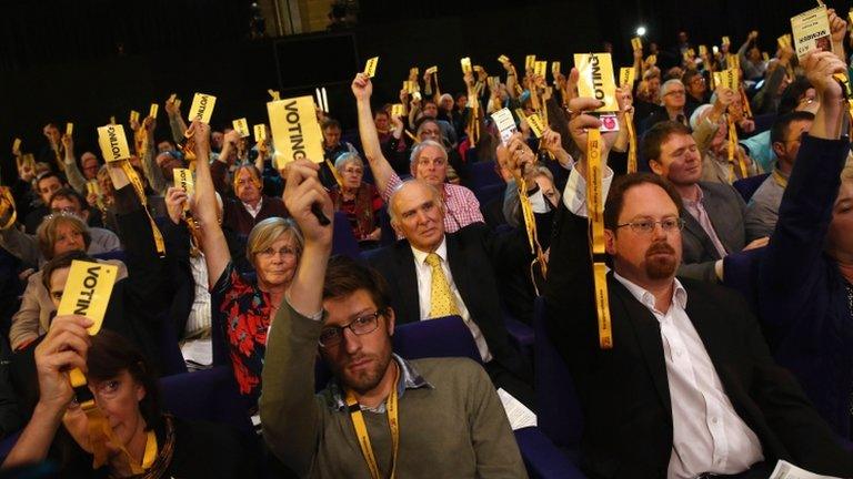 Delegates vote at the Lib Dem conference in Glasgow