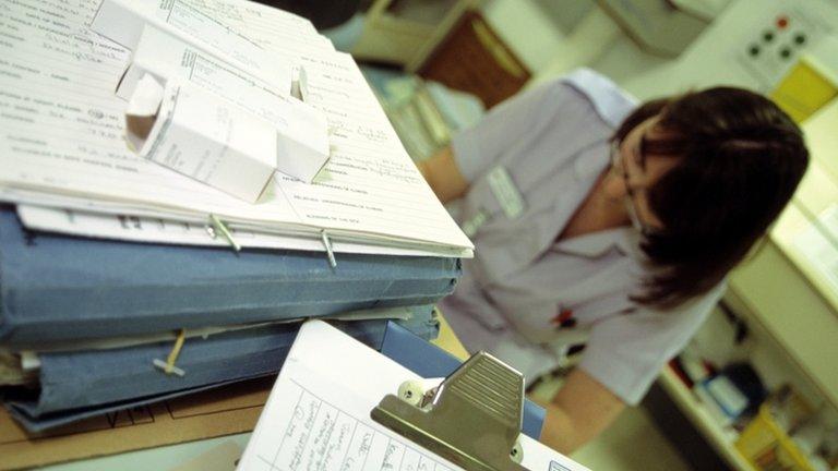 a nurse with medical records