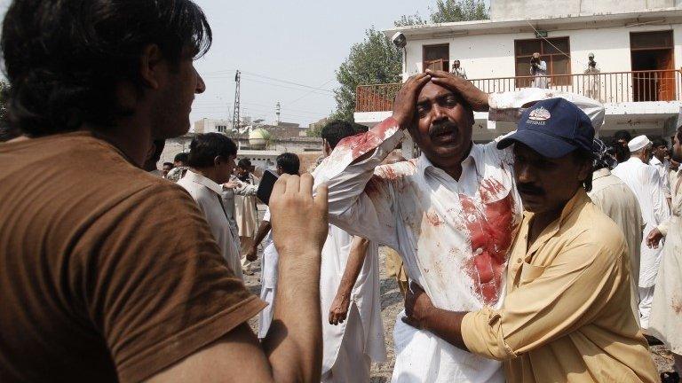 A man distraught outside the church