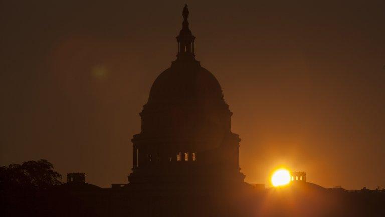 The sun rises over the Capitol in Washington 24 September 2013