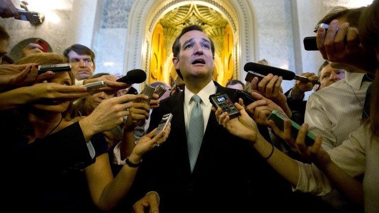 US Senator Ted Cruz talks to reporters after his marathon speech at the US Senate on 25 September 2013